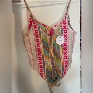 Never been worn en crème tank top